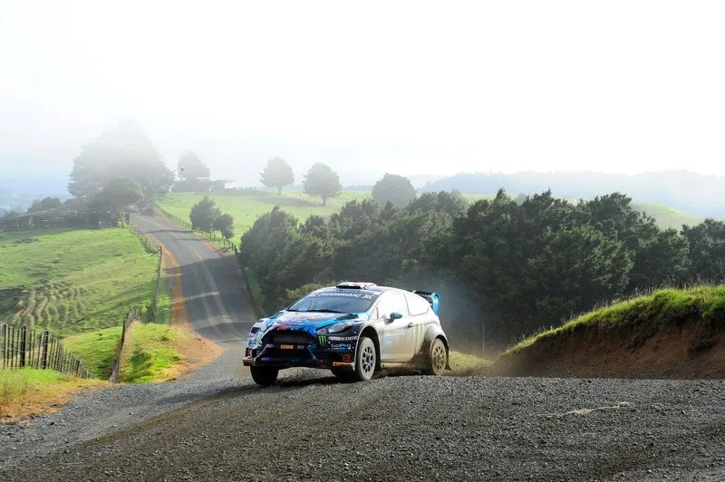 car drifting with a view of the coast