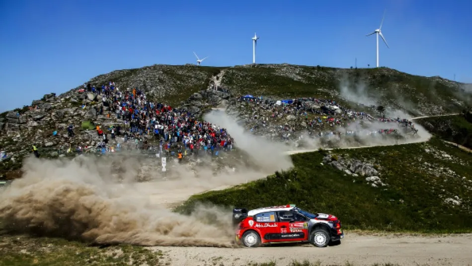 car drifting on a gravel