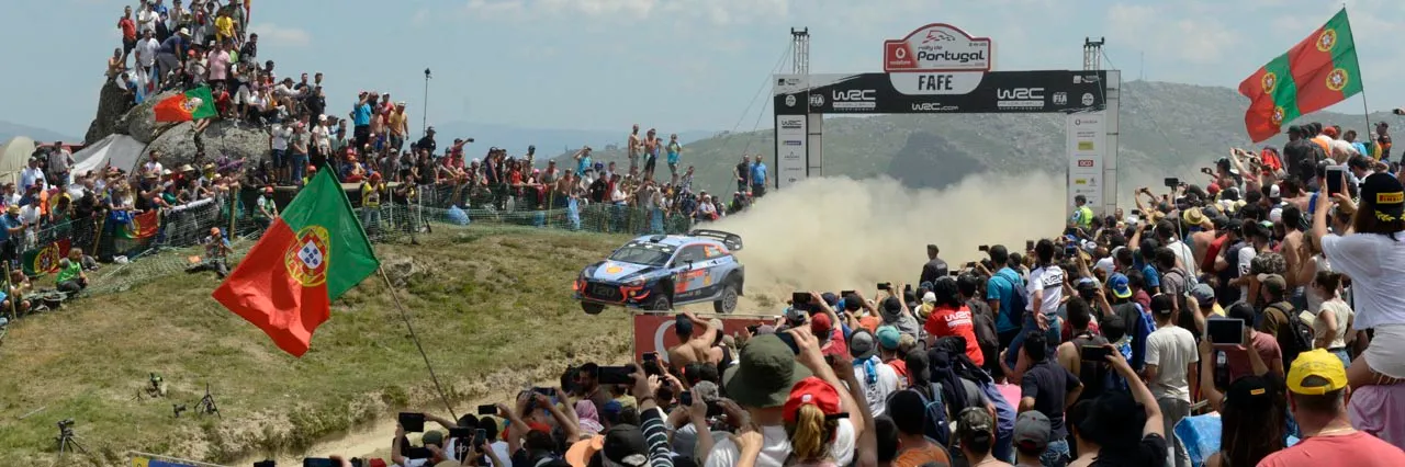 car drifting on a gravel